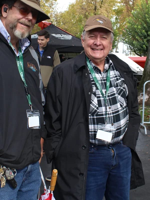 Two growers outside the trade show