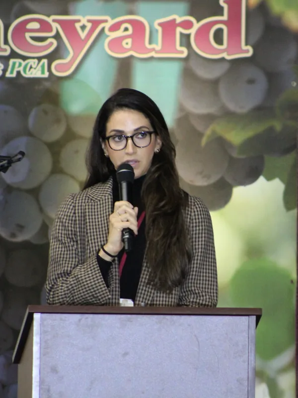 A speaker presenting to the hall
